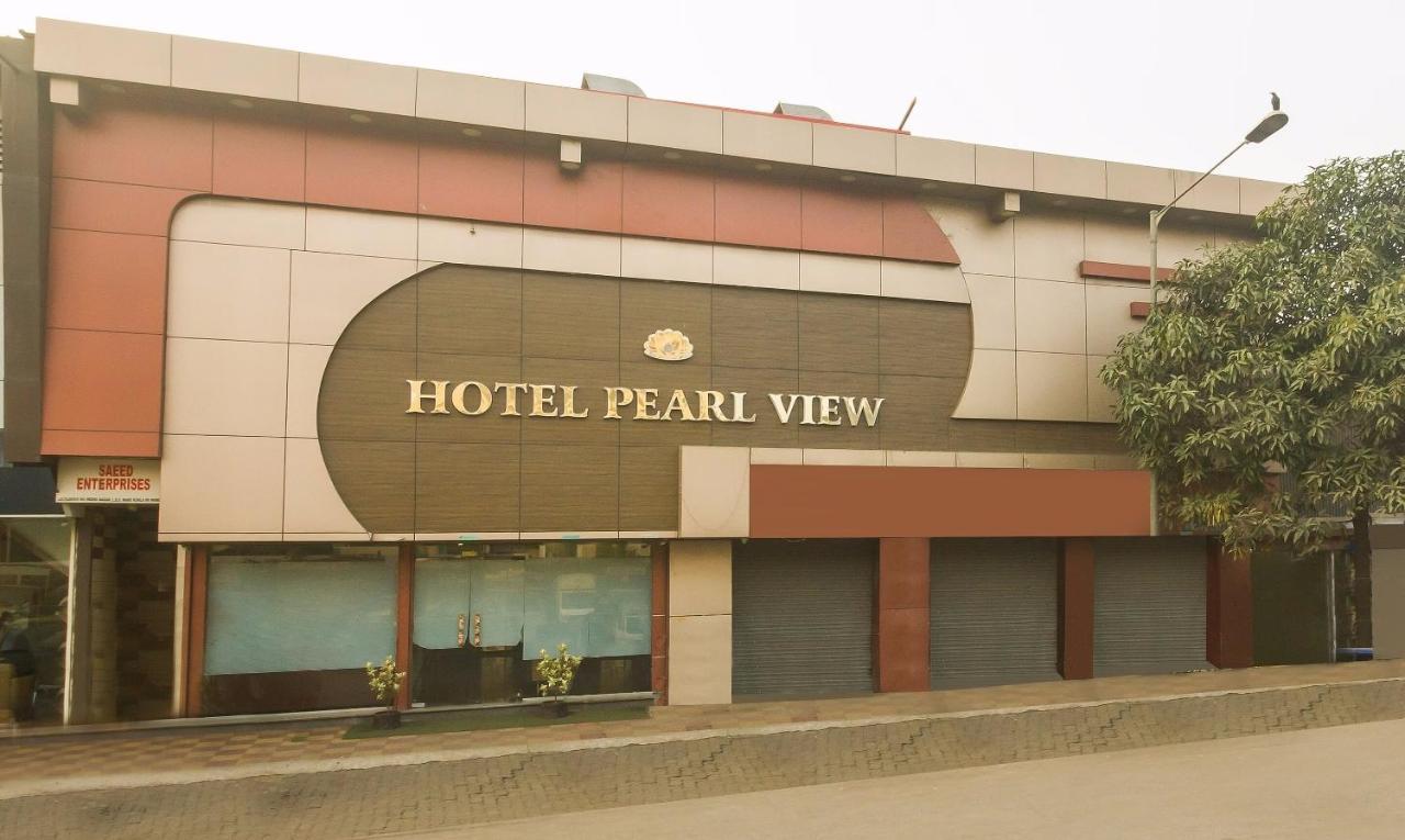 Capital O Hotel Pearl Near Us Embassy Mumbai Exterior photo